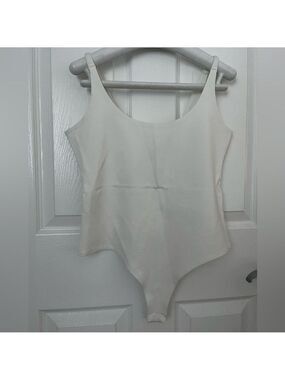 Stella Luce White Bodysuit, Size Medium.